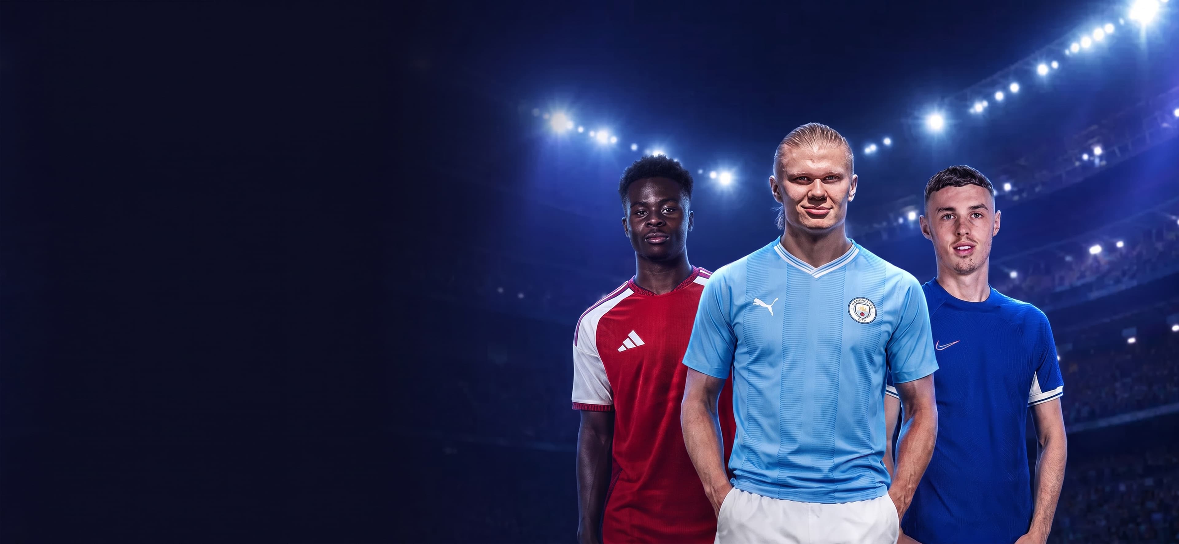 Premier League players in a floodlit stadium
